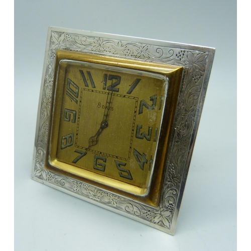 882 - A silver framed travel clock, Birmingham 1927, 72mm