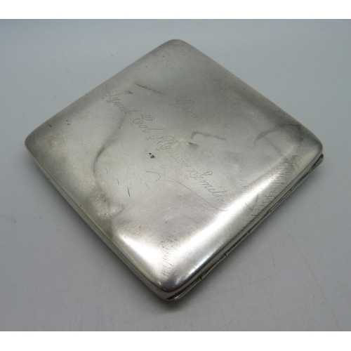 883 - A silver cigarette case, 116.8g, with inscription