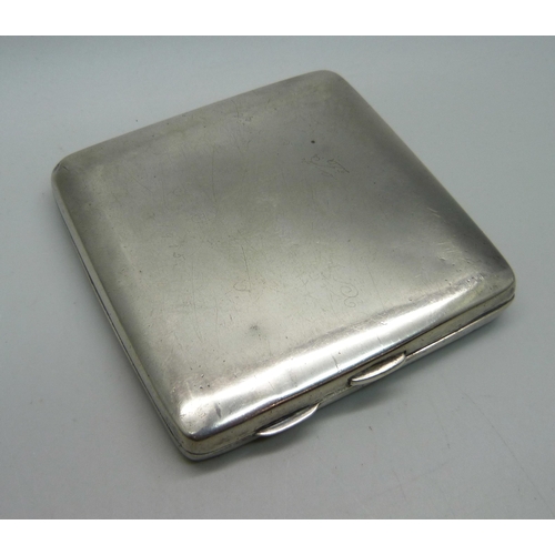 883 - A silver cigarette case, 116.8g, with inscription