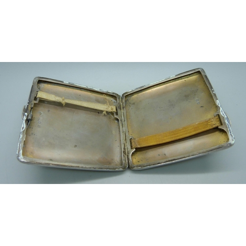 883 - A silver cigarette case, 116.8g, with inscription