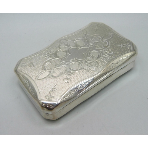 884 - A vintage snuff box, tests as silver, with continental control marks, 54g, 82mm wide