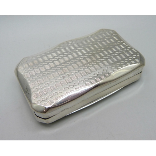 884 - A vintage snuff box, tests as silver, with continental control marks, 54g, 82mm wide