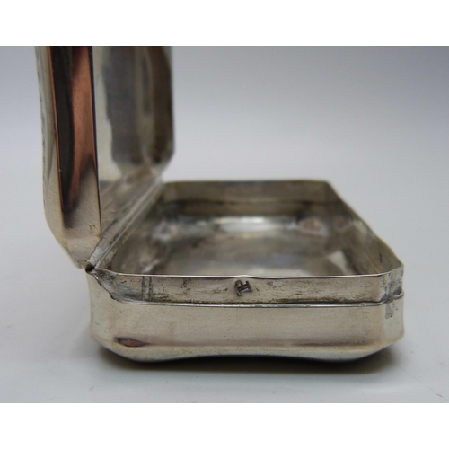 884 - A vintage snuff box, tests as silver, with continental control marks, 54g, 82mm wide