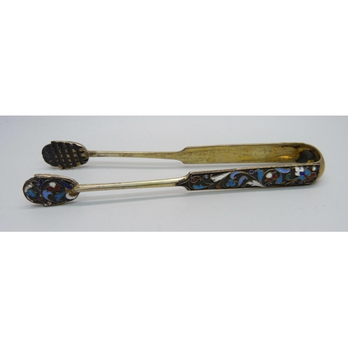 894 - Two Russian silver and enamelled spoons including a sifter, a pair of ice nips and a small fork, 99g