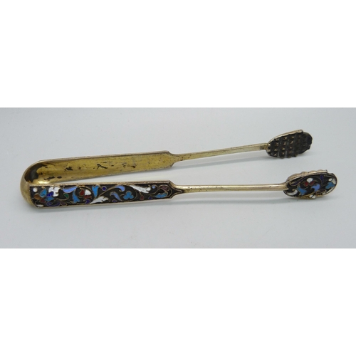 894 - Two Russian silver and enamelled spoons including a sifter, a pair of ice nips and a small fork, 99g