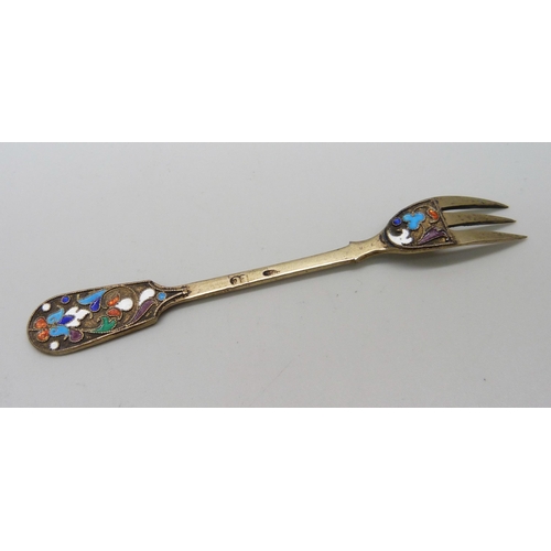 894 - Two Russian silver and enamelled spoons including a sifter, a pair of ice nips and a small fork, 99g