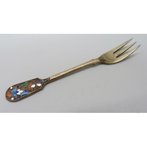 894 - Two Russian silver and enamelled spoons including a sifter, a pair of ice nips and a small fork, 99g