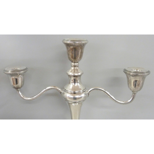 899 - A large silver candelabra, weighted base, London 1923, 2.8kg, 38cm