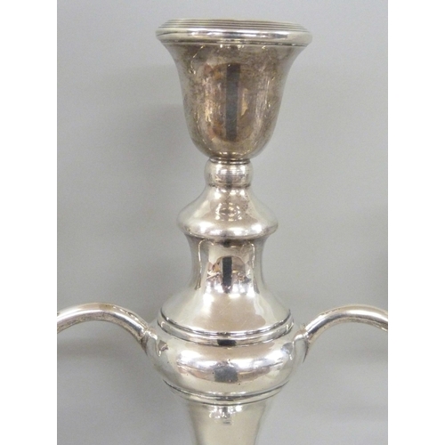 899 - A large silver candelabra, weighted base, London 1923, 2.8kg, 38cm