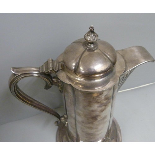 900 - A large white metal flagon, marks on the rim, 36cm tall, (1400g)