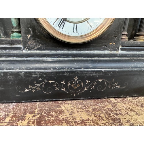 319 - A 19th Century French Belge noir mantle clock