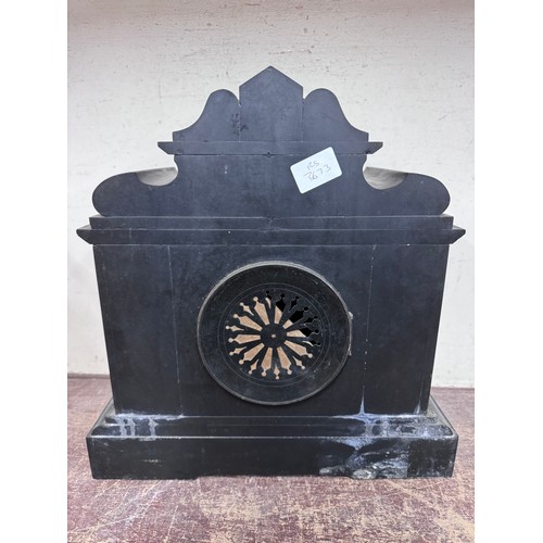 319 - A 19th Century French Belge noir mantle clock