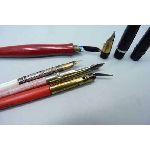 911 - Four dip pens and three fountain pen nibs, (one Sheaffer 14ct gold nib)