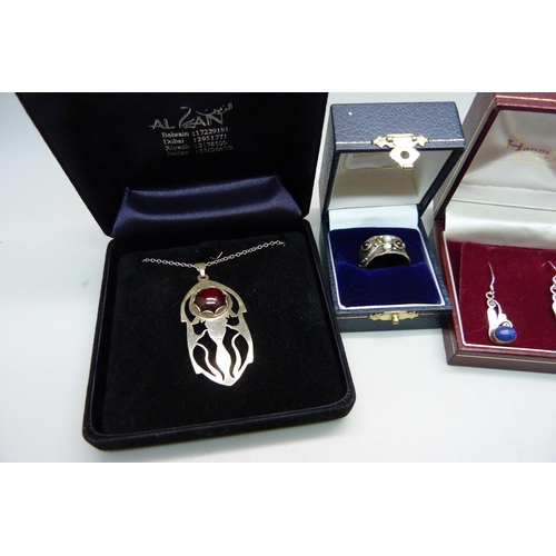 912 - An Art Nouveau ring, a pair of silver earrings, and a pendant on a silver chain