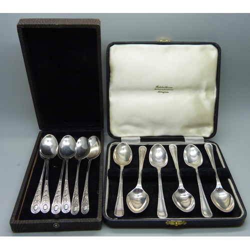 914 - Two sets of six silver spoons, 150g