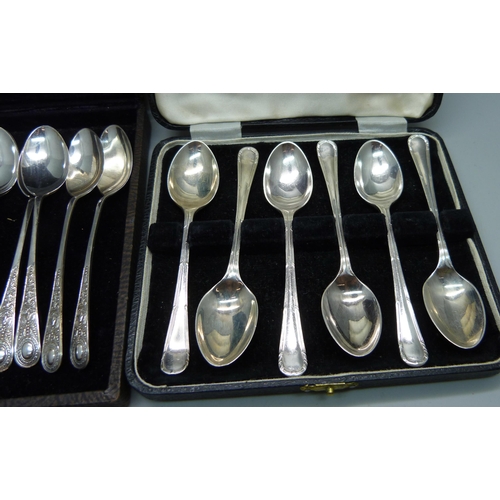 914 - Two sets of six silver spoons, 150g