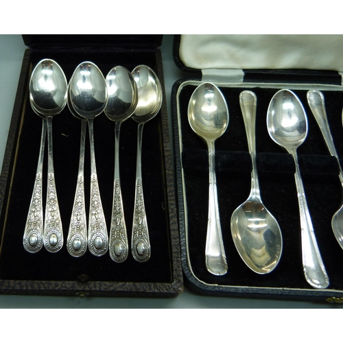 914 - Two sets of six silver spoons, 150g