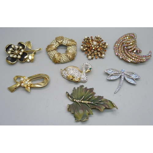 919 - A vintage leaf brooch signed BSK, one signed Sphinx and six other brooches