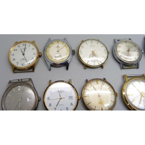 933 - A Titus Geneve wristwatch head and other wristwatch heads, a/f