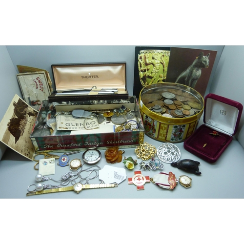 945 - A collection of costume jewellery, coins, pens and watches including lady's Tissot