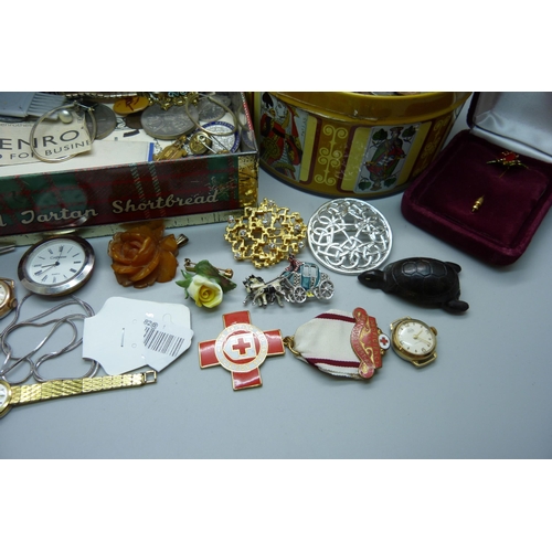 945 - A collection of costume jewellery, coins, pens and watches including lady's Tissot