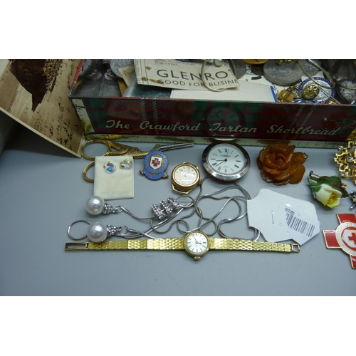 945 - A collection of costume jewellery, coins, pens and watches including lady's Tissot