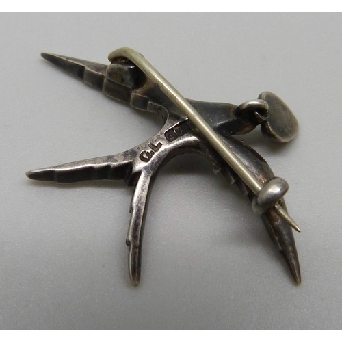 958 - A hallmarked silver swallow brooch, Birmingham 1900