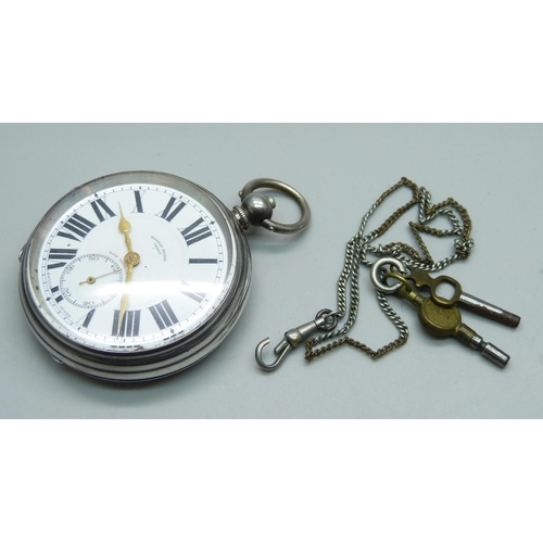 961 - A silver cased pocket watch, with keys, Harris Stone, Leeds, the case marked '2oz.'