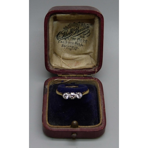 963 - An 18ct gold and diamond trilogy ring, 2.7g, Q, in a vintage box