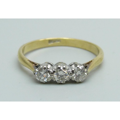 963 - An 18ct gold and diamond trilogy ring, 2.7g, Q, in a vintage box