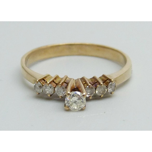 964 - A seven stone diamond ring, marked 14k, 1.7g, M