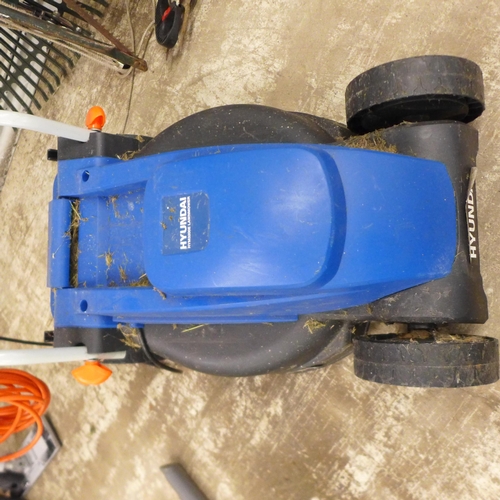 2155 - A quantity of gardening tools including a Hyundai HYM3200E electric lawn mower, an electric grass st... 