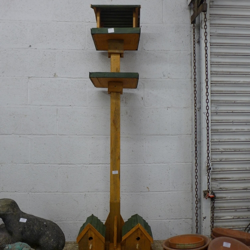 2158 - A two tiered wooden bird table and two bird boxes (can be dismantled)