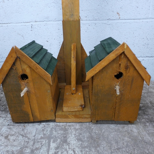 2158 - A two tiered wooden bird table and two bird boxes (can be dismantled)