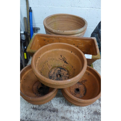 2163 - Two rectangular terracotta planters, five small terracotta planters and a large round terracotta pla... 