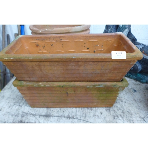 2163 - Two rectangular terracotta planters, five small terracotta planters and a large round terracotta pla... 