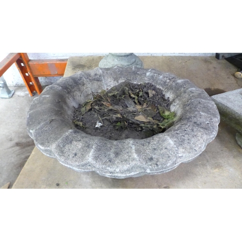 2173 - A three part stone effect concrete planter with pedestal base