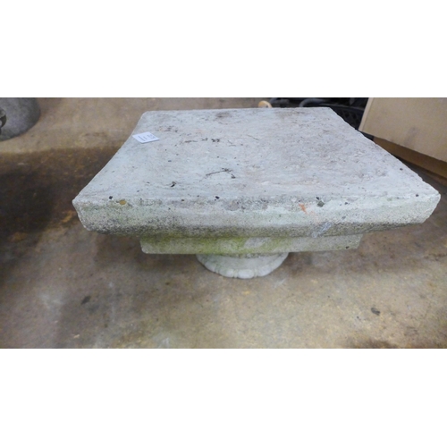 2173 - A three part stone effect concrete planter with pedestal base