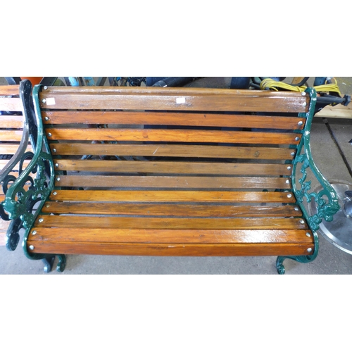 2182 - A cast metal and wood 125cm garden bench