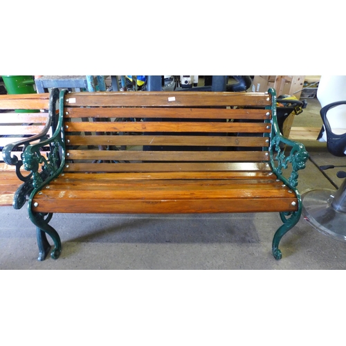 2183 - A cast metal and wood 128cm garden bench