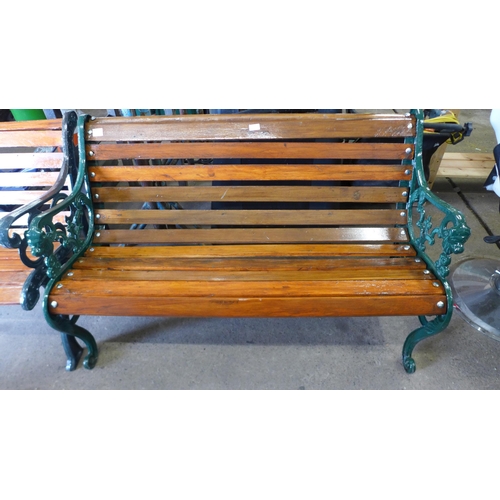 2183 - A cast metal and wood 128cm garden bench