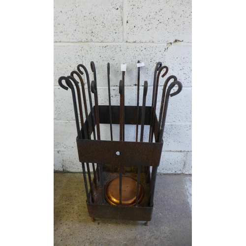 2185 - A large cast iron planter/log storage basket