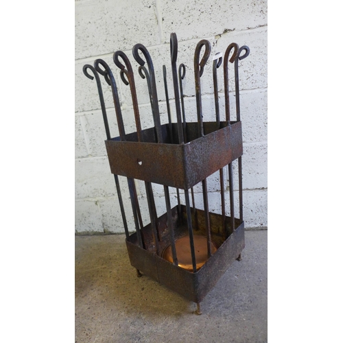 2185 - A large cast iron planter/log storage basket