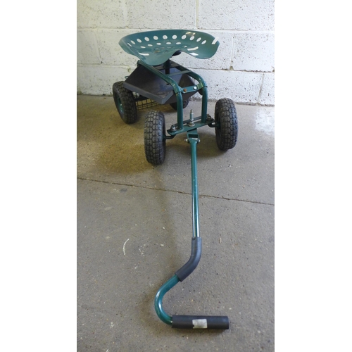 2187 - A four wheeled garden cart with tractor style work seat