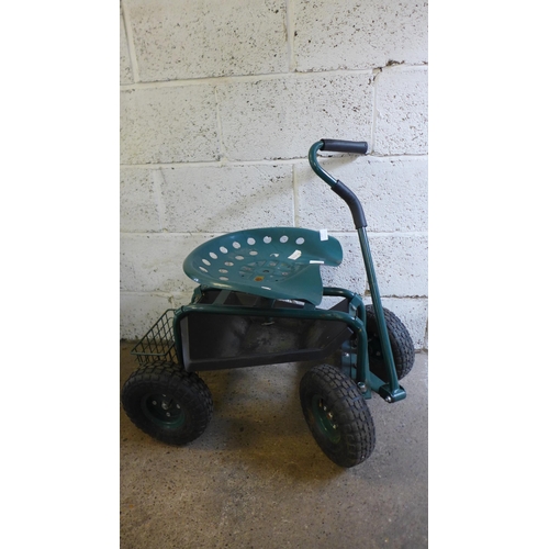 2187 - A four wheeled garden cart with tractor style work seat