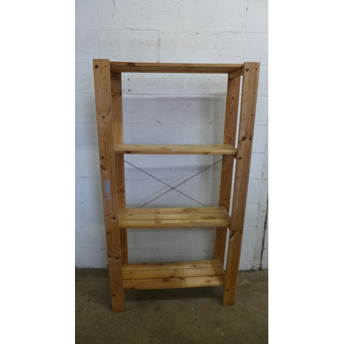 2194 - A wooden four shelf storage shelf unit - 175 x 95 x 35cm