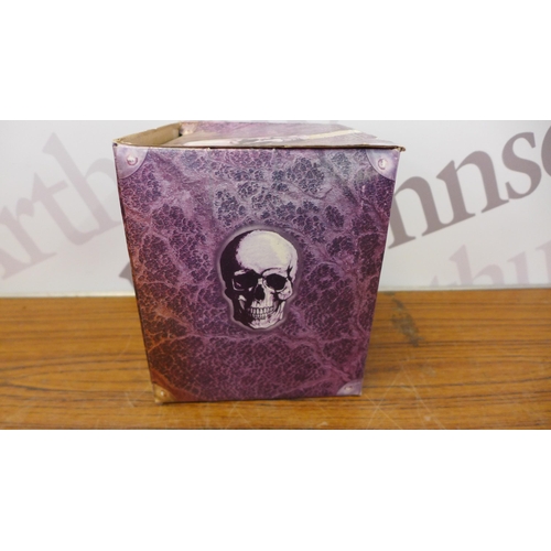 2200 - A plastic box of 7 unused skull money boxes & 5 unboxed