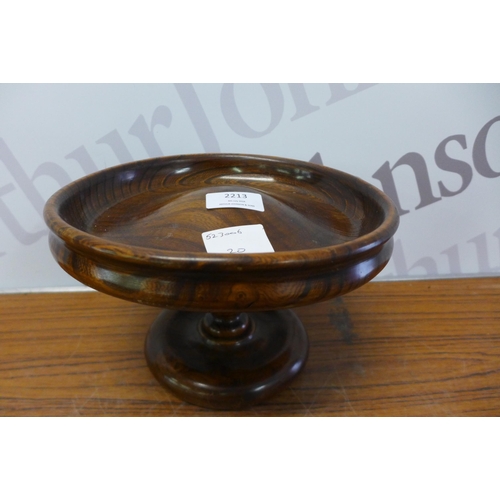 2213 - A pair of wooden candle stick holders and matching wooden fruit bowl