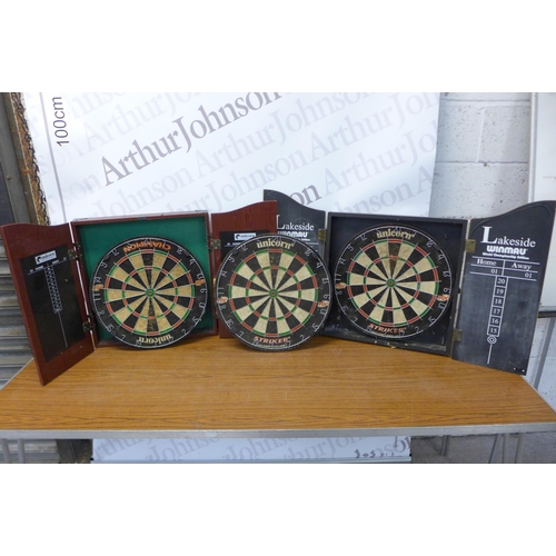 2269 - Three dartboards - two in wooden cabinets