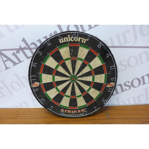 2269 - Three dartboards - two in wooden cabinets